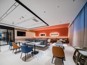 Ruang duduk di Echarm Hotel Xi'an Chanba International Exhibition Center
