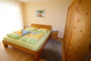 Postel nebo postele na pokoji v ubytování Villa Elsa Wohnung 9, nur 150 m vom Strand entfernt