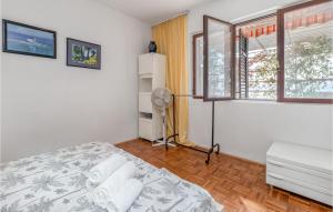 Posteľ alebo postele v izbe v ubytovaní Beautiful Apartment In Novi Vinodolski