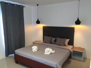 Postel nebo postele na pokoji v ubytování Non Du Lay Guesthouse