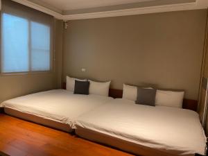 Postel nebo postele na pokoji v ubytování Lane 82 Hostel