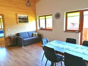 Posezení v ubytování Ferienwohnung Lacken