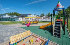 a park with a playground with a play equipment at 2 Bedroom Nice Home In Bobolin in Bobolin