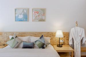 Letto o letti in una camera di Vretreats yunxishang Boutique Hotel