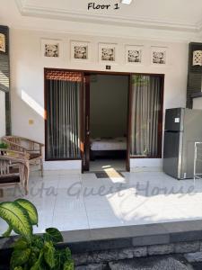 Postel nebo postele na pokoji v ubytování Nita Guest House Bali