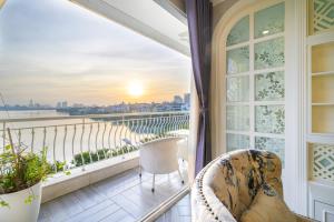 Balkón nebo terasa v ubytování Luxe Paradise Suites Xuan Dieu