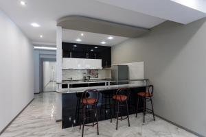 Η κουζίνα ή μικρή κουζίνα στο Shevchenko Residence