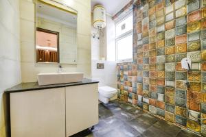Koupelna v ubytování FabHotel AK Villa