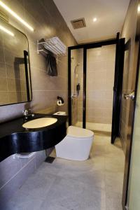 Ένα μπάνιο στο Ming Paragon Hotel