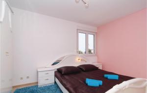 Postel nebo postele na pokoji v ubytování Apartment Split With Sea View 04