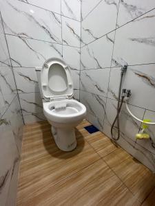 Vannituba majutusasutuses Sialang Damai Inn