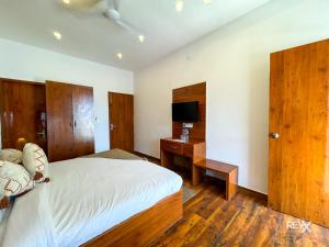 Rúm í herbergi á Hotel Wraveler Inn Mussoorie