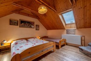 Postel nebo postele na pokoji v ubytování Vila Bobrík - Liptovská Mara