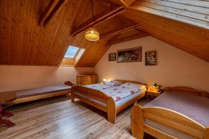 Postel nebo postele na pokoji v ubytování Vila Bobrík - Liptovská Mara