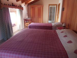 Postel nebo postele na pokoji v ubytování Maison Gaudenzio