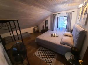 a bedroom with a large bed and a window at Apartment Katarina in Hvar +19 photos