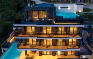 an aerial view of a building with a swimming pool at Villa Rhapsody 2 Aurelia 2 in Makarska