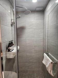 a bathroom with a shower and a sink at International Ocean Park 9 in Incheon