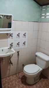 Koupelna v ubytování Kiniman Home