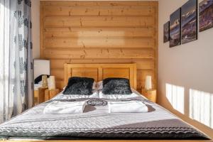 Postel nebo postele na pokoji v ubytování RentPlanet - Zakopane Kościelisko + 15 fotografií