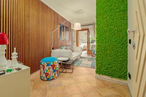 A bed or beds in a room at ILIA'S House Porto Rotondo