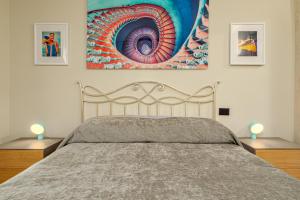 A bed or beds in a room at ILIA'S House Porto Rotondo