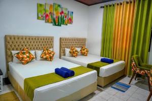 Postel nebo postele na pokoji v ubytování Adonai Spm Luxury Villa + 14 fotografií