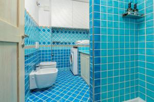 A bathroom at ILIA'S House Porto Rotondo