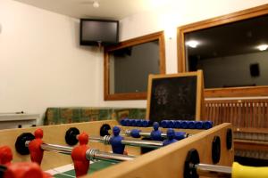 a room with a table with balls on it at Chalet Presanella in Temù