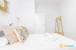 Postel nebo postele na pokoji v ubytování Casa del Pescador by LiveWork + 14 fotografií