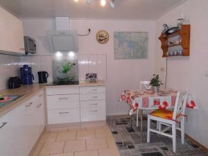 Η κουζίνα ή μικρή κουζίνα στο Komfortable Ferienwohnung