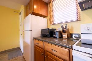 Kuchyň nebo kuchyňský kout v ubytování Kealia Resort 407