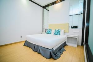 Postel nebo postele na pokoji v ubytování Kingston Hotel 5 - Chow Kit