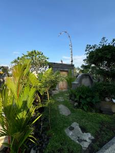 Κήπος έξω από το Uma Dewa Villa Sawah View