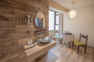 Fotografie z fotogalerie ubytování 泉州西街圆石静舍民宿 v destinaci Čchüan-čou + 37 fotografií