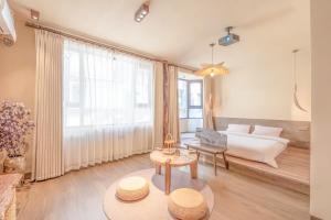 Voodi või voodid majutusasutuse 泉州西街圆石静舍民宿 toas