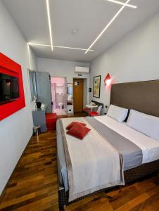 Postel nebo postele na pokoji v ubytování Affittacamere RFI