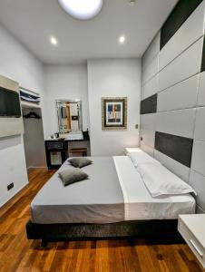 Postel nebo postele na pokoji v ubytování Affittacamere RFI