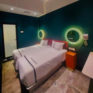 Postel nebo postele na pokoji v ubytování CJ HOUSE station 18 Ipoh