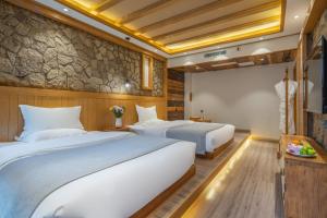 夕露古城中心店 XILU INN NANXI - Ancient City Center Branch客房内的一张或多张床位
