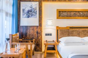 夕露古城中心店 XILU INN NANXI - Ancient City Center Branch客房内的一张或多张床位