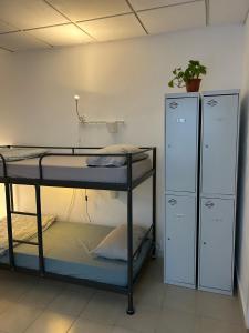 Posteľ alebo postele v izbe v ubytovaní NC Hostel