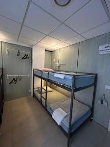 Posteľ alebo postele v izbe v ubytovaní NC Hostel