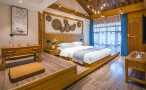 夕露古城中心店 XILU INN NANXI - Ancient City Center Branch客房内的一张或多张床位