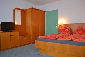 Postel nebo postele na pokoji v ubytování Apartmán Almberg - Mitterdorf - Mitterfirmiansrout