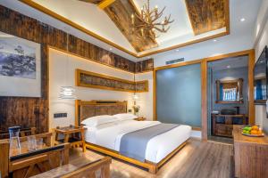 夕露古城中心店 XILU INN NANXI - Ancient City Center Branch客房内的一张或多张床位