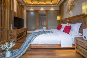 夕露古城中心店 XILU INN NANXI - Ancient City Center Branch客房内的一张或多张床位