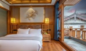夕露古城中心店 XILU INN NANXI - Ancient City Center Branch客房内的一张或多张床位