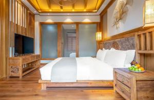 夕露古城中心店 XILU INN NANXI - Ancient City Center Branch客房内的一张或多张床位