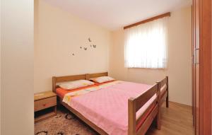 Postel nebo postele na pokoji v ubytování Holiday Home Kakma V